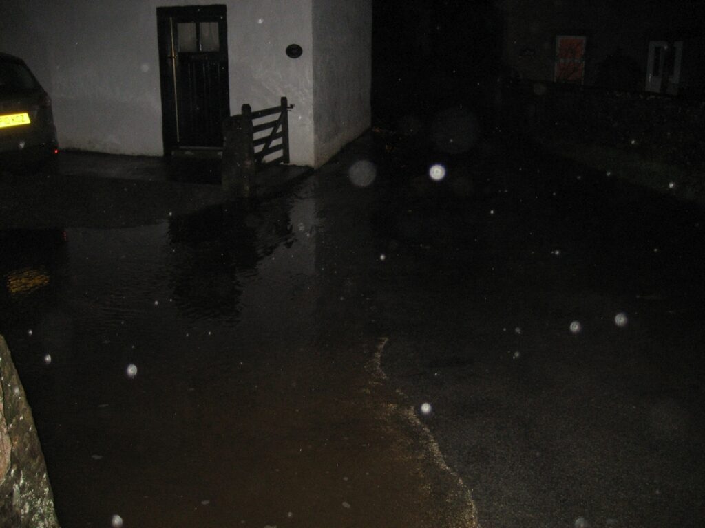 2010 11 02 Dovenby Flood Lane Water Drains Through White House Forecourt To Beck